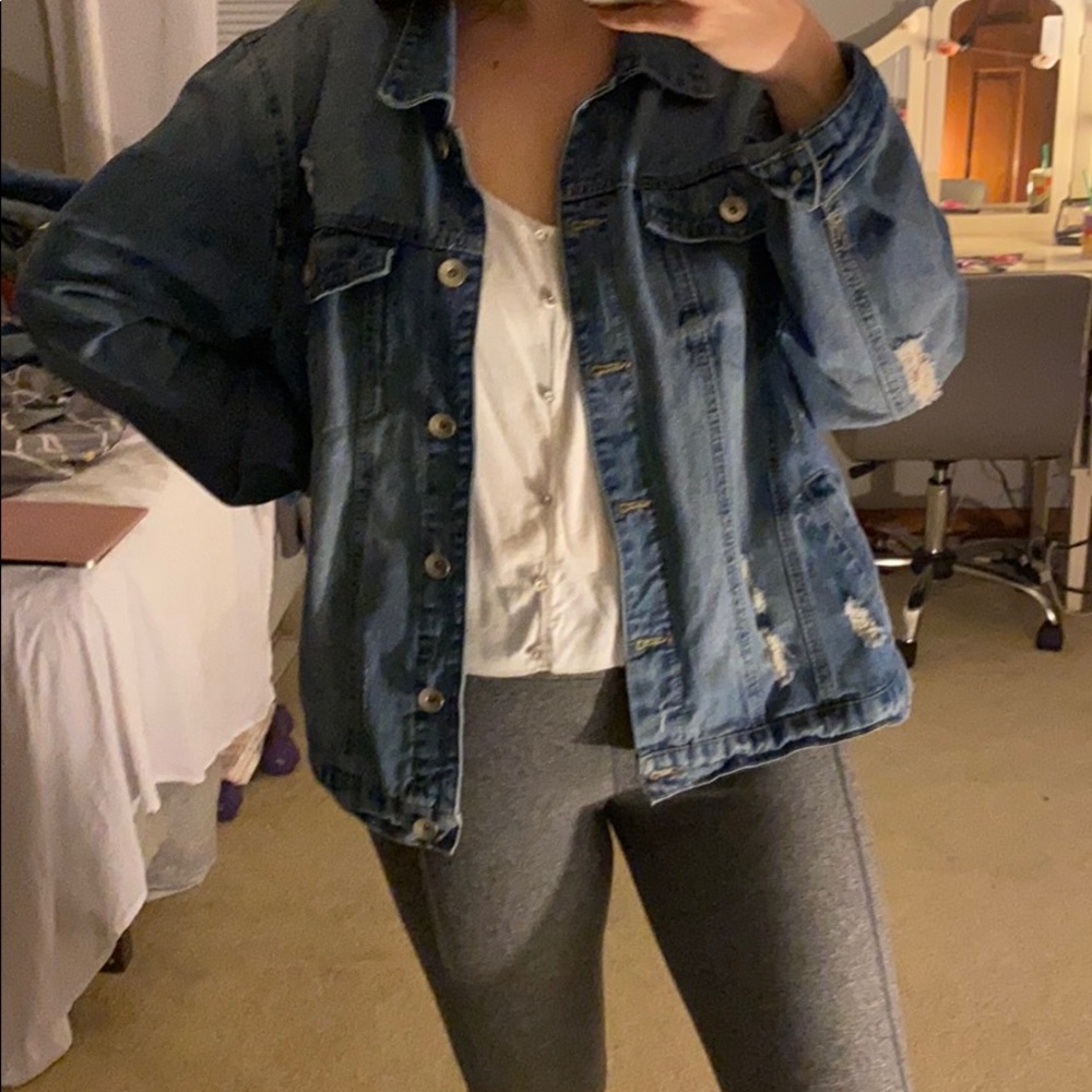 Distressed denim jacket